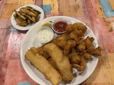 Fisherman’s Platter dinner with perch, cod and shrimp and a deep-fried zucchini.